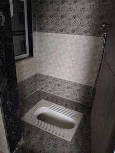 Common Bathroom Image of 622 Sq.ft 1 BHK Apartment / Flat for sale in Construxus Planet 6, Pushpak Nagar Navi Mumbai for Rs. 5615000