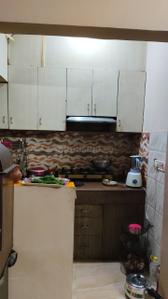 Kitchen Image of 700 Sq.ft 2 BHK Independent House for sale in Vishnu Garden New Delhi for Rs. 4550000