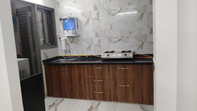 Kitchen Image of 1575 Sq.ft 2 BHK Apartment / Flat for rent in Swagat Kingsland, Sargasan Gandhinagar for Rs. 28000