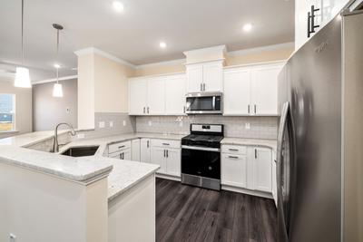 Kitchen Image of 1805 Sq.ft 3 BHK Apartment / Flat for sale in Hafeezpet Hyderabad for Rs. 13718000