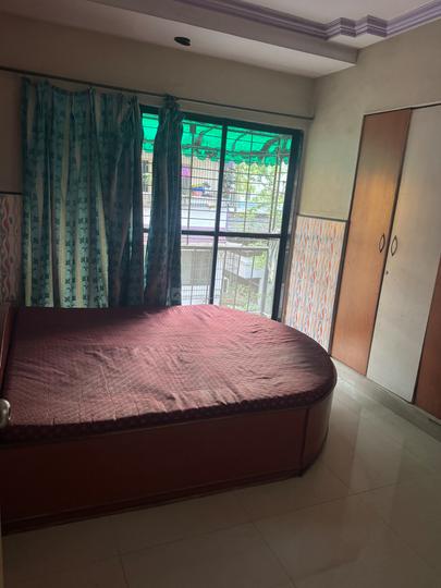 Sneh Sudama Apartment Bedroom 1