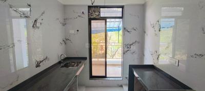 Kitchen Image of 650 Sq.ft 1 BHK Apartment / Flat for sale in Thakurli Thane for Rs. 4500000