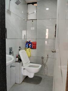 Common Bathroom Image of 1242 Sq.ft 2 BHK Apartment / Flat for sale in Krishna Orchid, Kotarpur Ahmedabad for Rs. 4000000