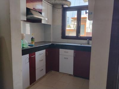 Kitchen Image of 1150 Sq.ft 2 BHK Builder Floor for rent in Sector 27 Gurgaon for Rs. 40000