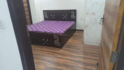 Bedroom Image of 1100 Sq.ft 2 BHK Builder Floor for rent in Palam Vihar Extension Gurgaon for Rs. 15000
