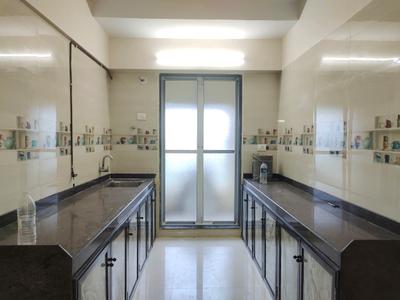 Kitchen Image of 1010 Sq.ft 2 BHK Apartment / Flat for rent in Abhigna Avirahi Heights, Malad West Mumbai for Rs. 45000