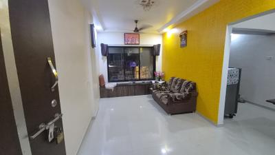Living Room Image of 600 Sq.ft 2 BHK Apartment / Flat for sale in Kilbil CHS, Dahisar East Mumbai for Rs. 13500000