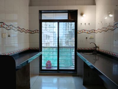 Kitchen Image of 705 Sq.ft 1 BHK Apartment / Flat for sale in Pushpak Nagar Navi Mumbai for Rs. 4550000