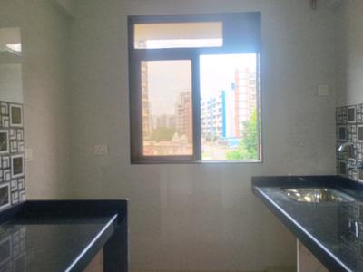 Kitchen Image of 700 Sq.ft 1 BHK Apartment / Flat for sale in Metro Pride, Thakurli Thane for Rs. 4900000