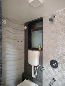Common Bathroom Image of 658 Sq.ft 1 BHK Apartment / Flat for sale in Meet Ashok Smruti, Kasarvadavali Thane for Rs. 6400000