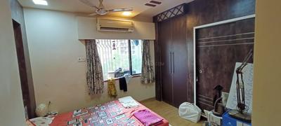 Bedroom Image of 750 Sq.ft 2 BHK Apartment / Flat for sale in Kandivali West Mumbai for Rs. 12500000