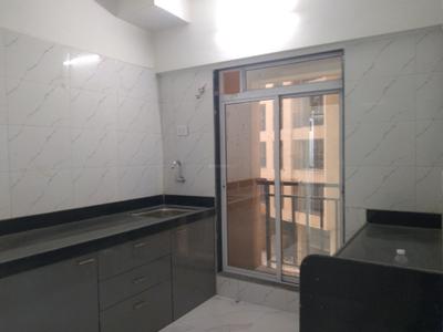 Kitchen Image of 705 Sq.ft 1 BHK Apartment / Flat for sale in Munish Emonics Tower, Vasai East Vasai for Rs. 3877000