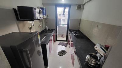 Kitchen Image of 700 Sq.ft 1 BHK Apartment / Flat for rent in Lodha Lakeshore Greens, Palava Phase 2 Thane for Rs. 16000