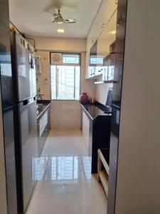 Kitchen Image of 930 Sq.ft 2 BHK Apartment / Flat for rent in Cosmos Classique, Thane West Thane for Rs. 40000