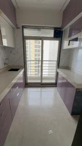 Kitchen Image of 480 Sq.ft 1 BHK Apartment / Flat for rent in Gajra Bhoomi Lawns, Shilgaon Thane for Rs. 19500