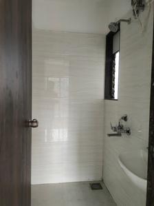 Common Bathroom Image of 600 Sq.ft 1 BHK Apartment / Flat for sale in Dharti Pressidio, Malad West Mumbai for Rs. 9300000