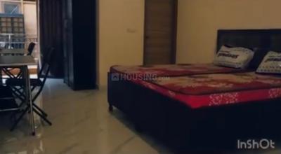 Bedroom Image of Girls PG in Sector 18, Noida
