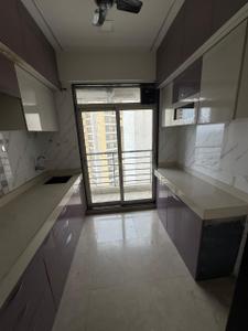 Kitchen Image of 480 Sq.ft 1 BHK Apartment / Flat for rent in Gajra Bhoomi Lawns, Shilgaon Thane for Rs. 19500