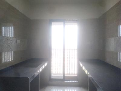 Kitchen Image of 910 Sq.ft 3 BHK Apartment / Flat for sale in Tharwani Vedant Millenia, Titwala Thane for Rs. 6100000