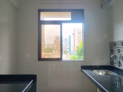 Kitchen Image of 711 Sq.ft 1 BHK Apartment / Flat for sale in Trishan Enclave, Kalyan West Kalyan for Rs. 3799000