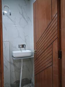 Common Bathroom Image of 1100 Sq.ft 2 BHK Apartment / Flat for sale in Hometech Pride, Sector 73 Noida for Rs. 4250000