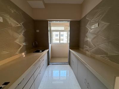 Kitchen Image of 850 Sq.ft 2 BHK Apartment / Flat for rent in Raunak Unnathi Woods Supreme, Hiranandani Estate Thane for Rs. 32000