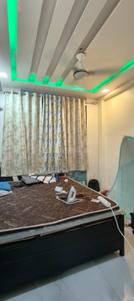 Bedroom Image of 950 Sq.ft 2 BHK Apartment / Flat for rent in Kopar Khairane Navi Mumbai for Rs. 38000
