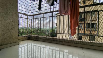 Balcony Image of 670 Sq.ft 1 BHK Apartment / Flat for sale in Om Prabhu Manohar CHS, Seawoods Navi Mumbai for Rs. 12600000