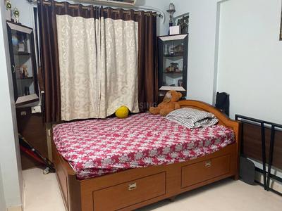 Bedroom Image of 680 Sq.ft 1.5 BHK Apartment / Flat for rent in Kashish Park, Dharamveer Nagar Thane for Rs. 40000
