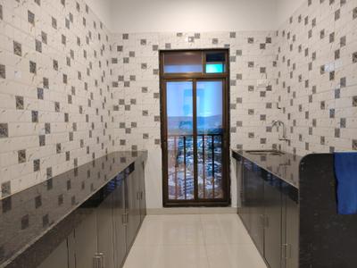 Kitchen Image of 900 Sq.ft 2 BHK Apartment / Flat for sale in Laxmi Icon, Taloja Navi Mumbai for Rs. 6000000