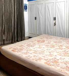 Bedroom Image of Kawal PG in Rajouri Garden, New Delhi