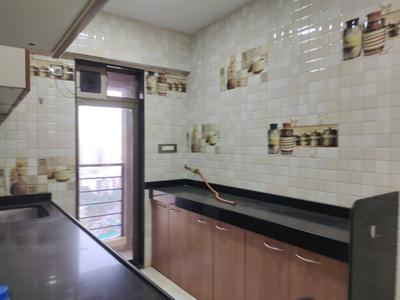 Kitchen Image of 815 Sq.ft 2 BHK Apartment / Flat for sale in Sangam Emporio Towers, Malad West Mumbai for Rs. 17500000