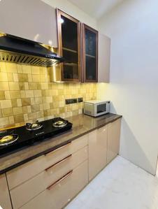 Kitchen Image of 1250 Sq.ft 1 BHK Apartment / Flat for rent in Suncity Jewel Of India, Bajaj Nagar Jaipur for Rs. 9000
