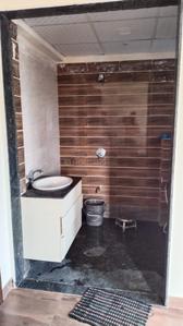 Bathroom Image of 800 Sq.ft 1 BHK Apartment / Flat for sale in Metadesign Mblu, Anandvalli Nashik for Rs. 3875000