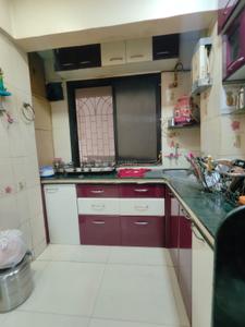 Kitchen Image of 600 Sq.ft 1 BHK Apartment / Flat for sale in Kopar Khairane Navi Mumbai for Rs. 7000000