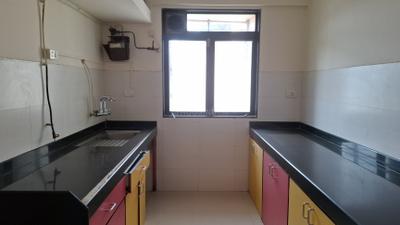 Kitchen Image of 975 Sq.ft 2 BHK Apartment / Flat for sale in Lodha Paradise, Thane West Thane for Rs. 16000000