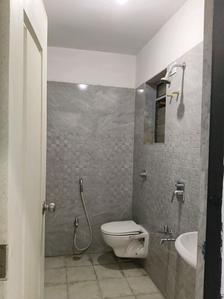 Common Bathroom Image of 551 Sq.ft 1 BHK Apartment / Flat for sale in Cosmos Meluha, Khidkali Thane for Rs. 4300000