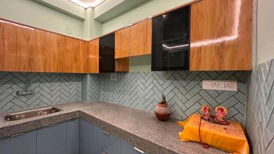 Kitchen Image of 700 Sq.ft 2 BHK Builder Floor for rent in Palam Vihar Gurgaon for Rs. 32000
