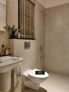 Common Bathroom Image of 900 Sq.ft 2 BHK Apartment / Flat for sale in Rustomjee La Familia, Thane West Thane for Rs. 16000000