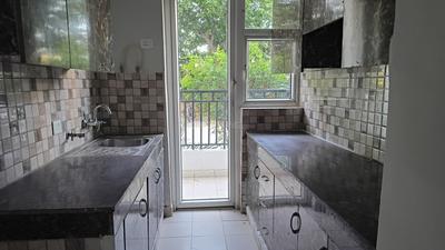Kitchen Image of 1050 Sq.ft 2 BHK Apartment / Flat for sale in Mapsko Paradise, Sector 83 Gurgaon for Rs. 10200000