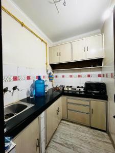 Kitchen Image of 850 Sq.ft 2.5 BHK Apartment / Flat for sale in Sri Niwaspuri New Delhi for Rs. 11000000