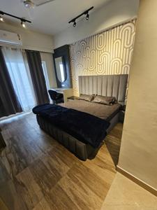 Bedroom Image of 435 Sq.ft 1 RK Studio for rent in Paramount Pine And Oak Studio, Surajpur Greater Noida for Rs. 18000