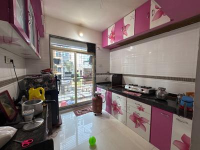 Kitchen Image of 735 Sq.ft 1 BHK Apartment / Flat for sale in Manohar Vikas Shreeji Paraiso Phase 2, Badlapur East Badlapur for Rs. 3500000