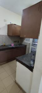 Kitchen Image of 1000 Sq.ft 2 BHK Apartment / Flat for rent in Grand Omaxe, Sector 93B Noida for Rs. 31000