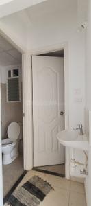 Bathroom Image of 650 Sq.ft 2 BHK Apartment / Flat for rent in Urbanrise Revolution One, Padur Chennai for Rs. 20500