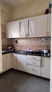 Kitchen Image of 600 Sq.ft 1 BHK Apartment / Flat for rent in Halasuru Bengaluru for Rs. 28000