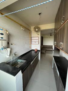 Kitchen Image of 963 Sq.ft 2 BHK Apartment / Flat for rent in Swagat Afford, Sargasan Gandhinagar for Rs. 29000