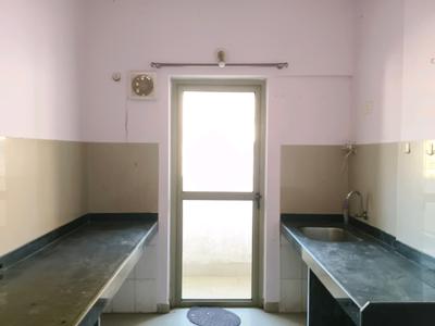 Kitchen Image of 690 Sq.ft 1 BHK Apartment / Flat for sale in Vardhaman Tower, Sagarli Gaon Thane for Rs. 4325000
