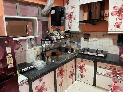 Kitchen Image of 975 Sq.ft 2 BHK Apartment / Flat for sale in Siddha Happyville, Rajarhat Kolkata for Rs. 7300000