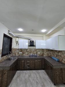 Kitchen Image of 1200 Sq.ft 2 BHK Builder Floor for rent in Sector 52A Gurgaon for Rs. 65000